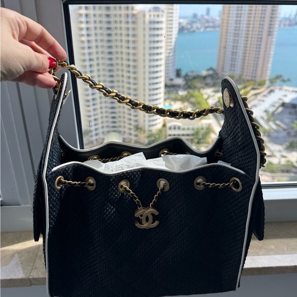 CHANEL Handbags - Chanel Black Raffia 25 Small Bag